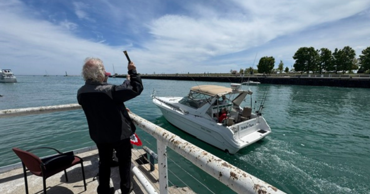 Blessing of the Fleet Charter fishing boats heading out on the lake