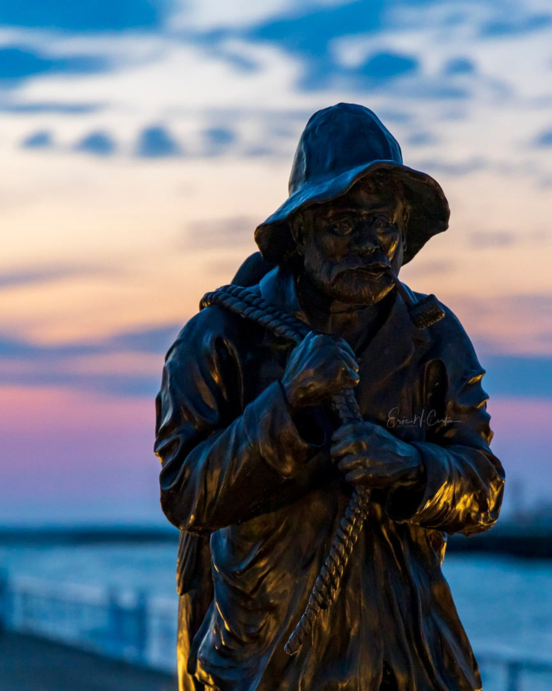 Fisherman Sculpture Fisherman sculpture in Rotary Park in Port Washington