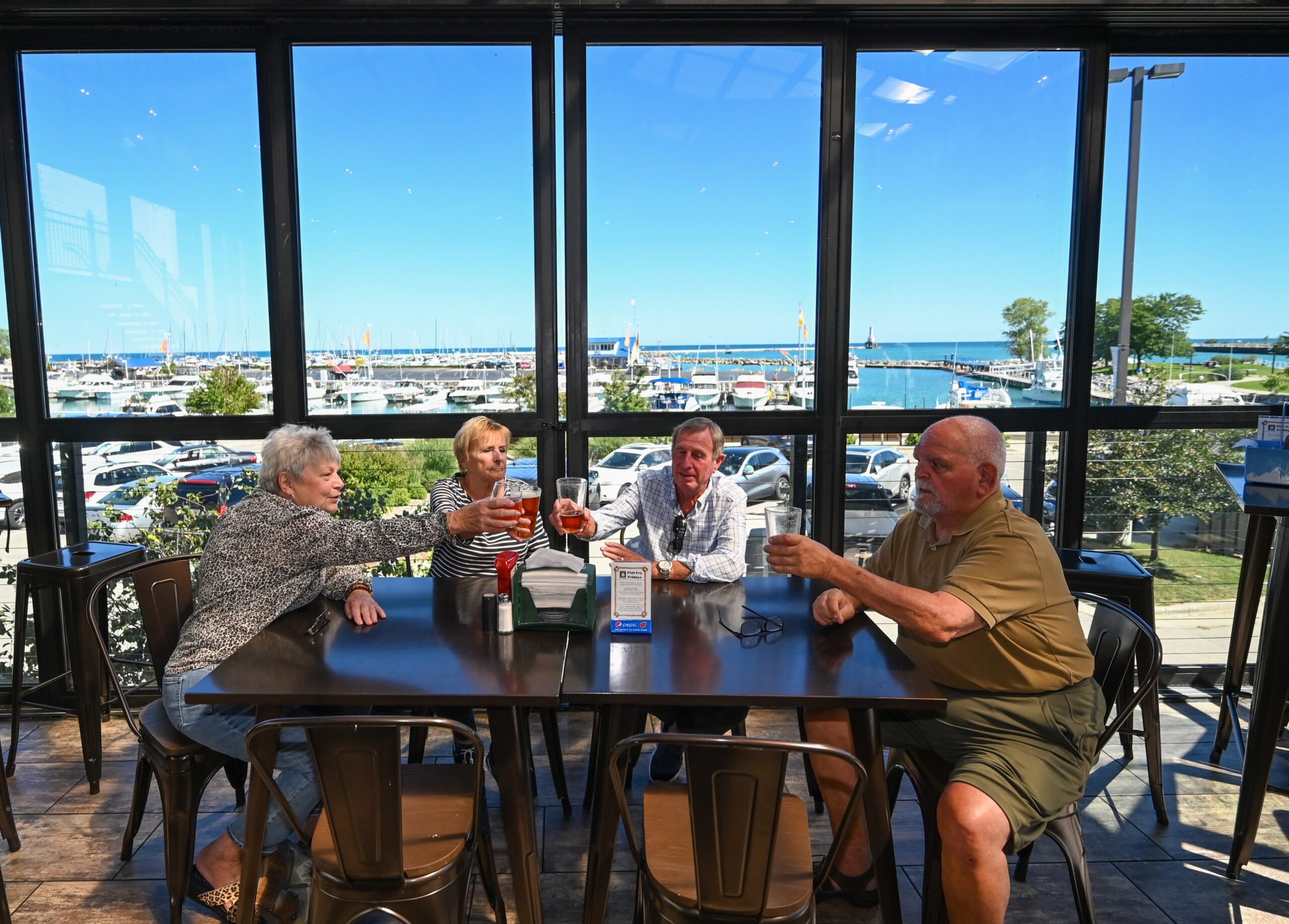 A Port Washington restaurant. Enjoying wine on the patio at Cavelier Wine Bar on Lake Michigan