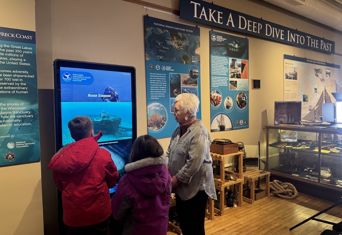 Shipwreck Exhibit at Historical Society Kids using an interactive shipwreck exhibit at the Port Washington Historical Society