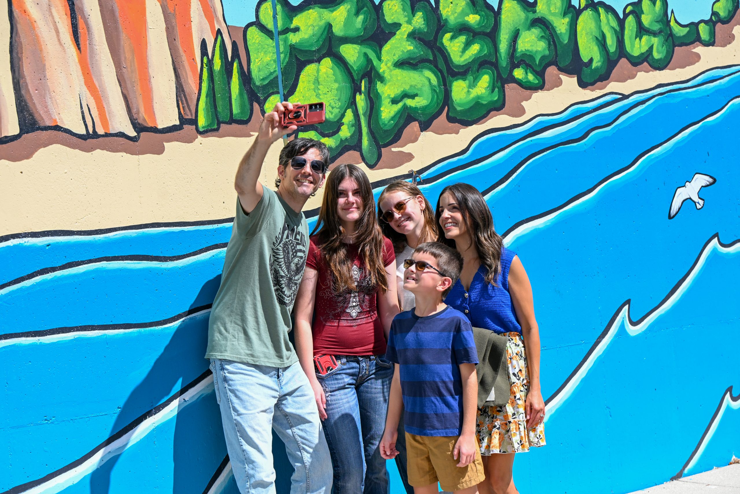 Family selfie at Branching Out mural